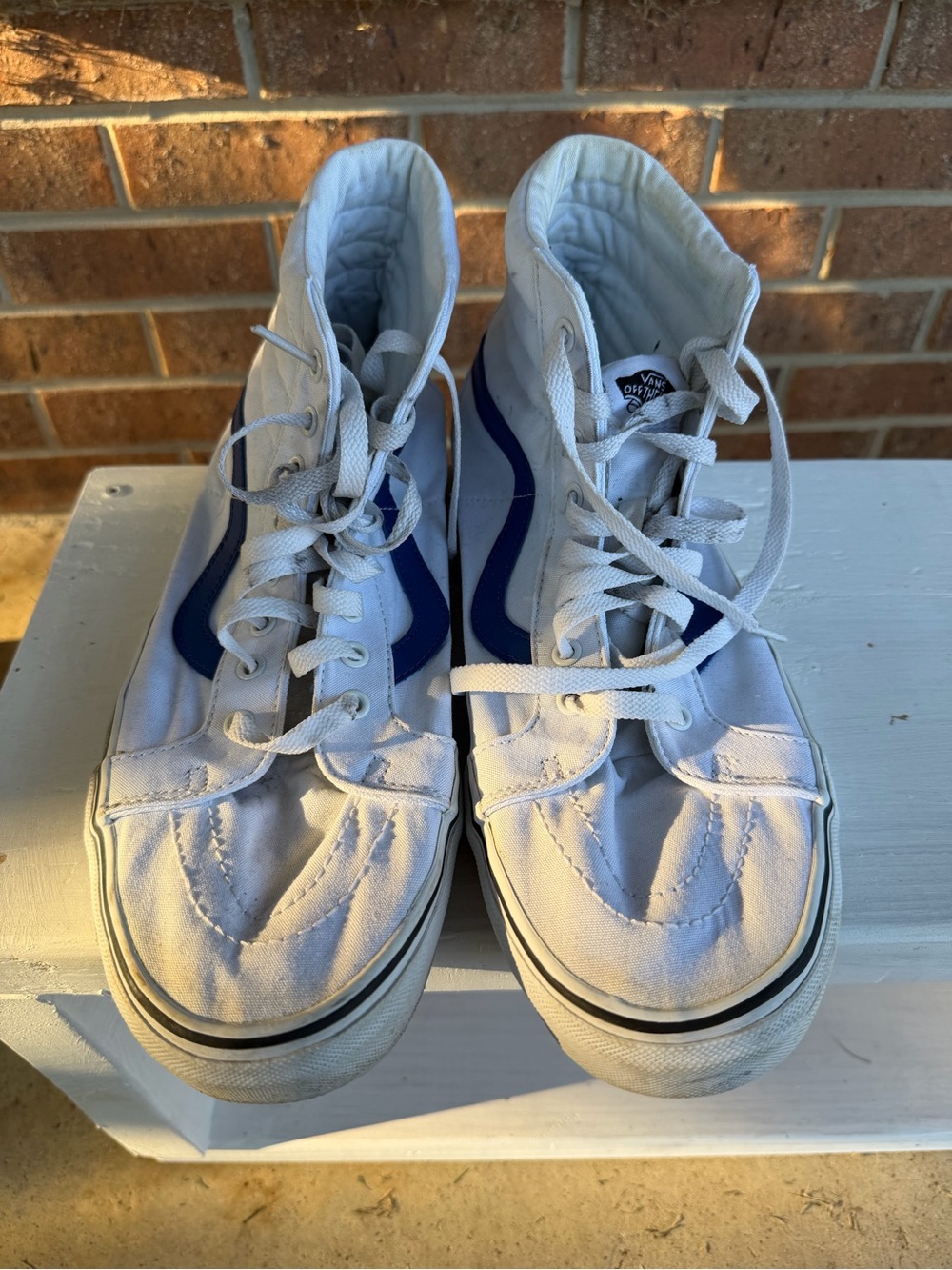 Vans Men’s High-Top Canvas Sneakers in White with Blue Side Stripe
